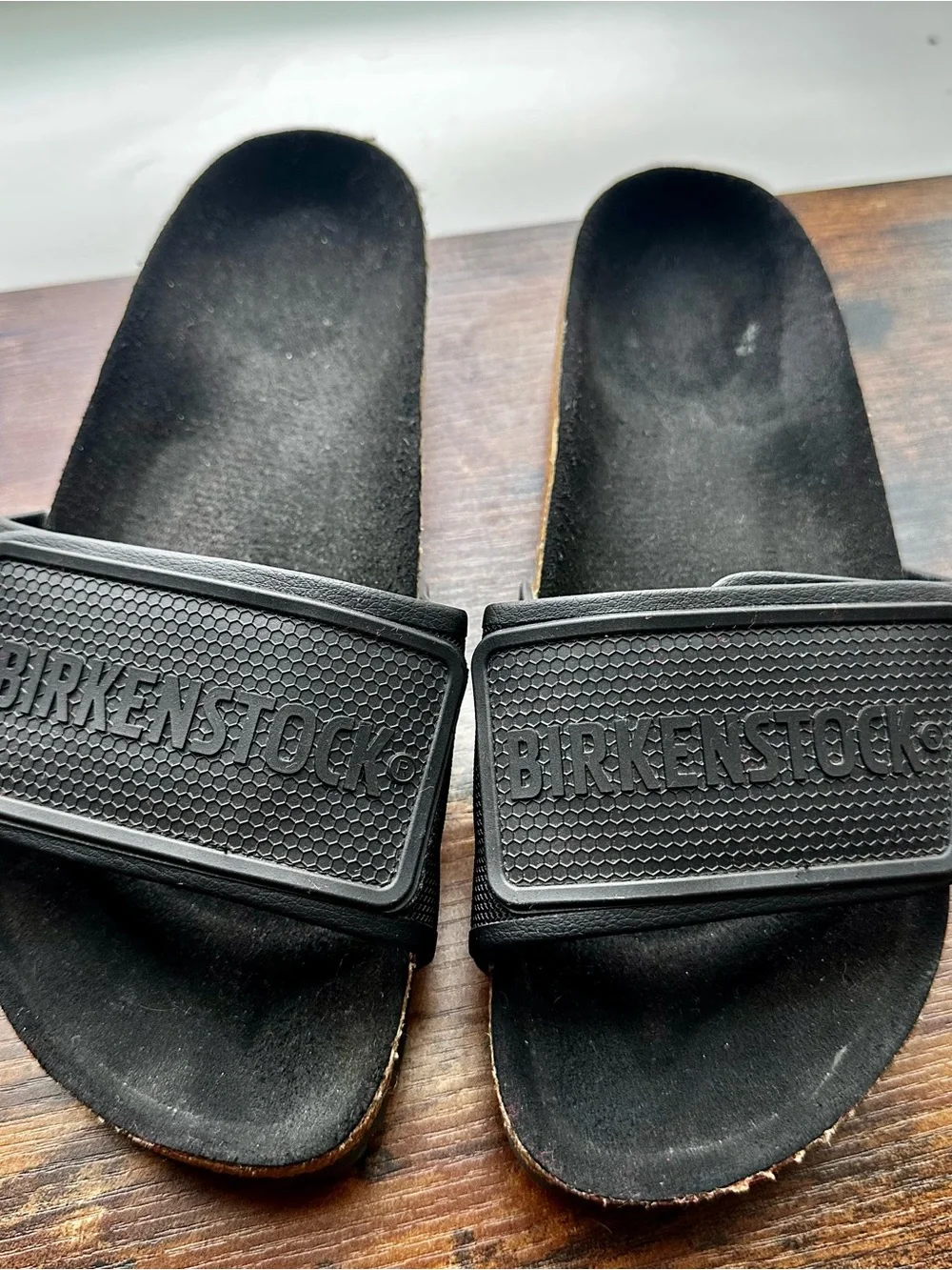 Birkenstock Tema Black Slide Sandals with Embossed Strap